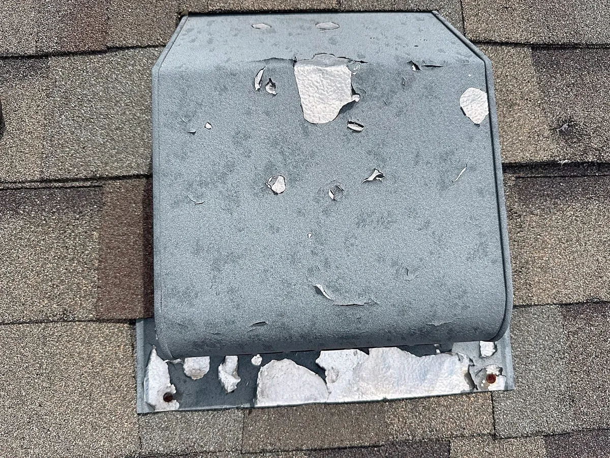 Damaged roof vent on the existing roof