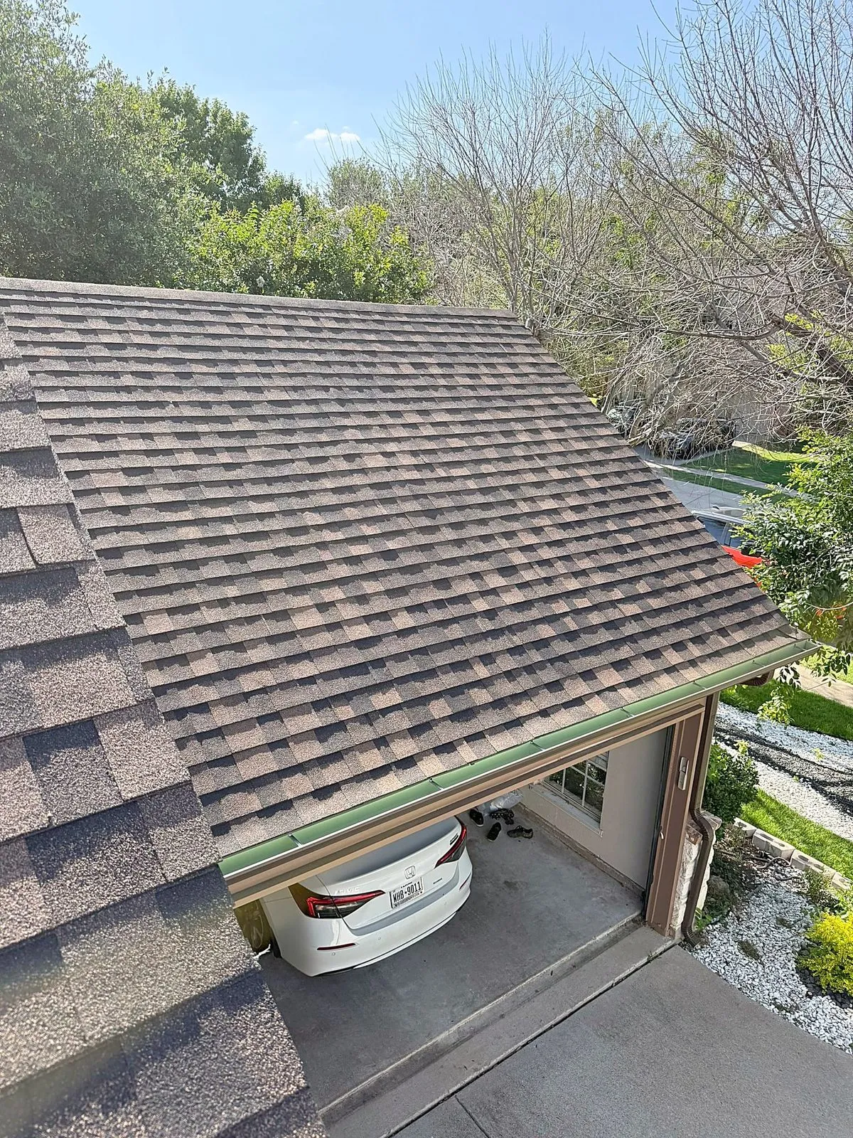 Finished shingles along the ridge