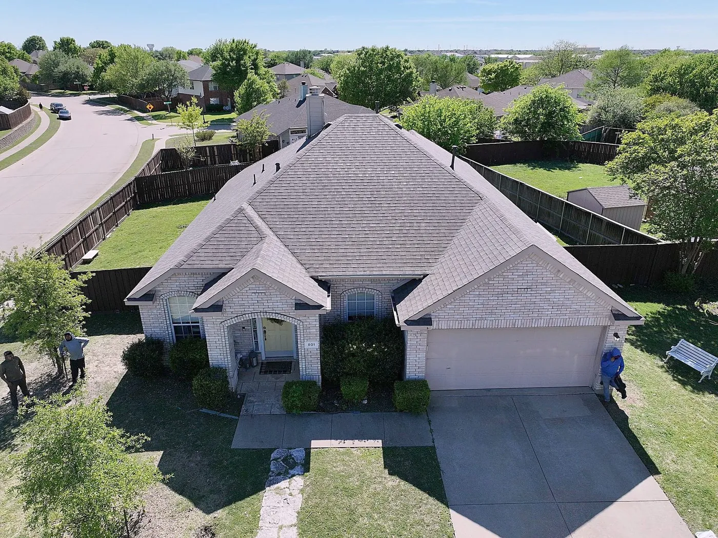 Completed roof replacement on a McKinney home, seen from above