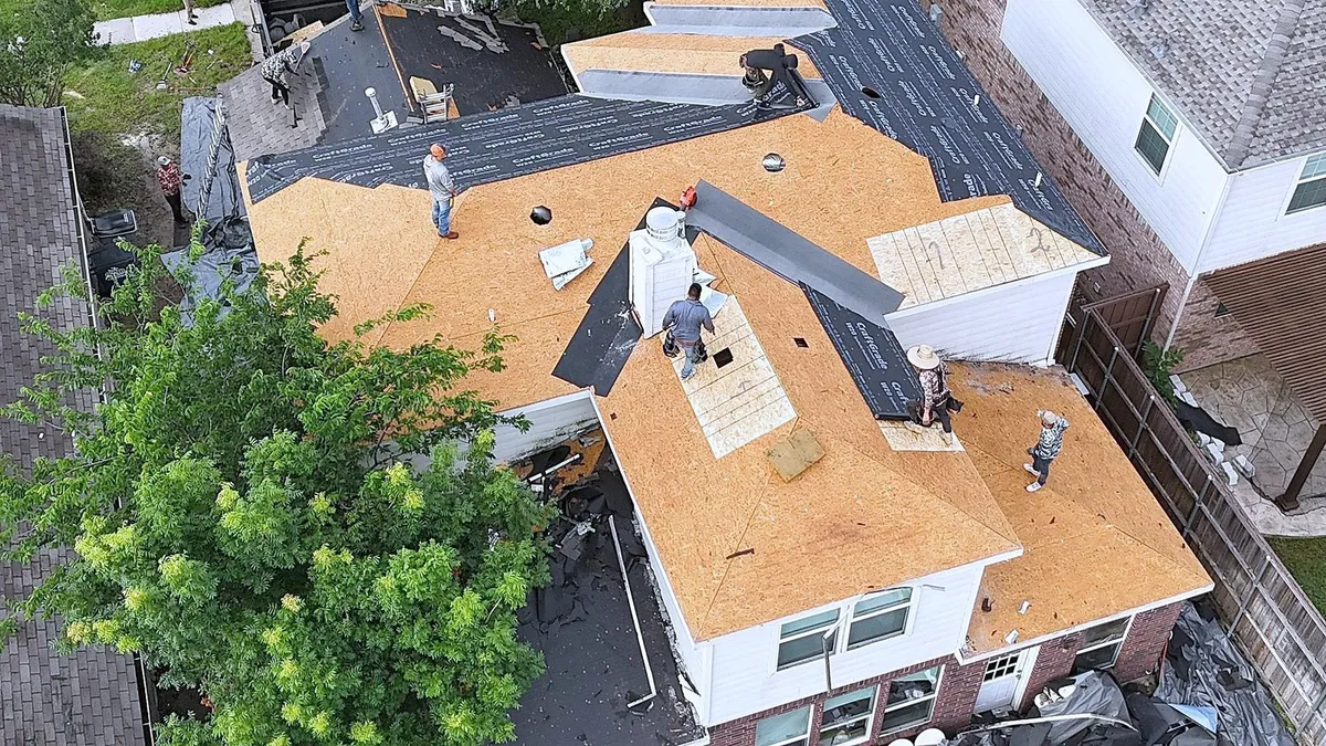 Aerial view of the roof mid-replacement