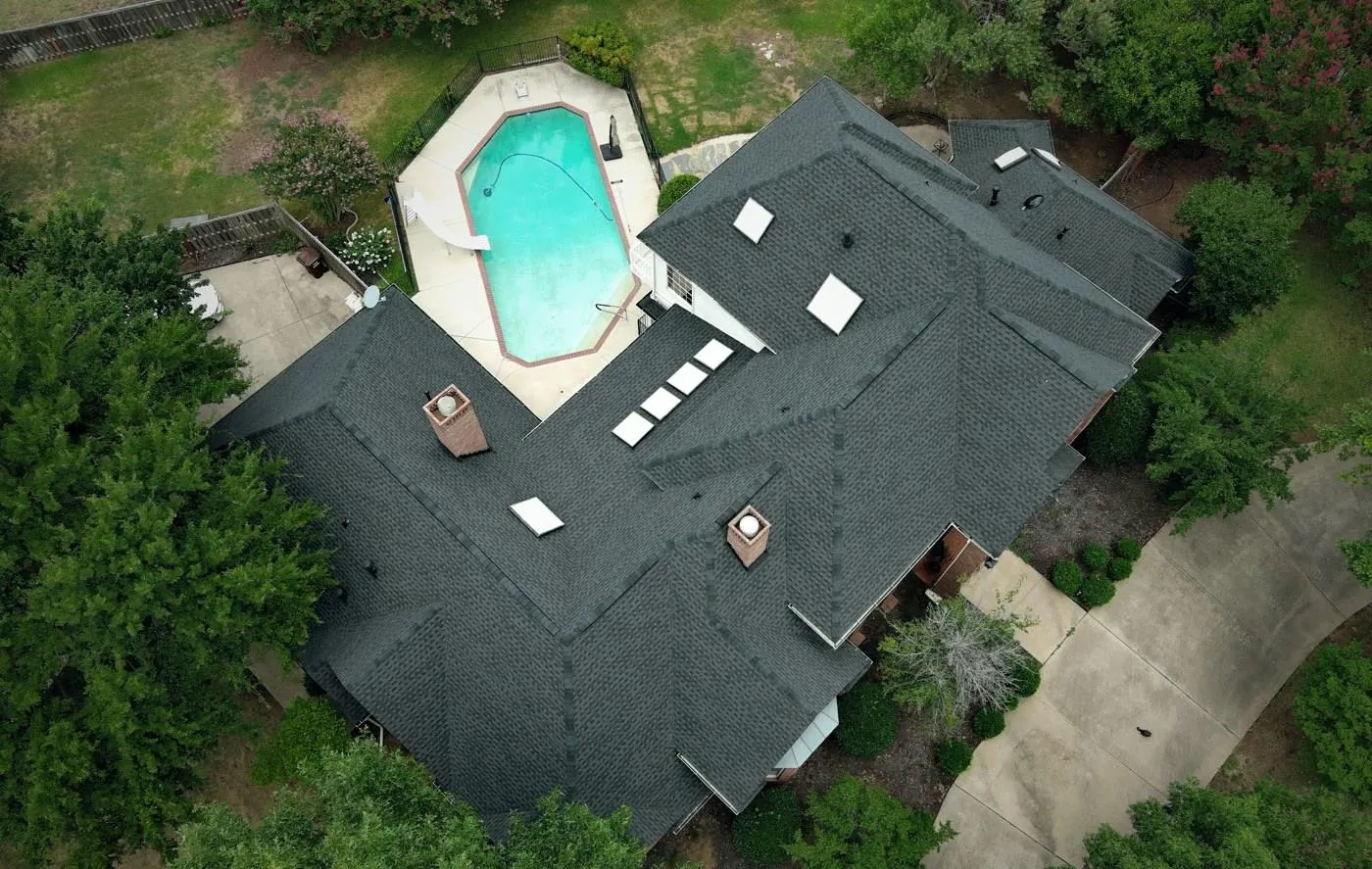 Storm-damaged roof documented for an insurance claim